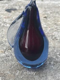 This item is a vintage Murano glass pear paperweight, often designed by artists