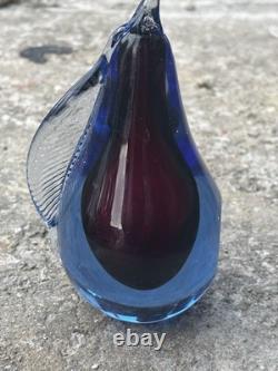 This item is a vintage Murano glass pear paperweight, often designed by artists