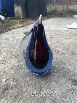 This item is a vintage Murano glass pear paperweight, often designed by artists