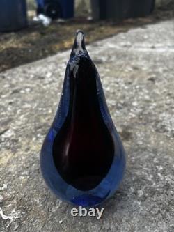 This item is a vintage Murano glass pear paperweight, often designed by artists