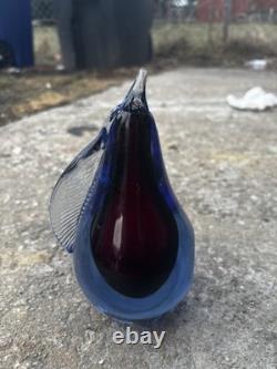 This item is a vintage Murano glass pear paperweight, often designed by artists